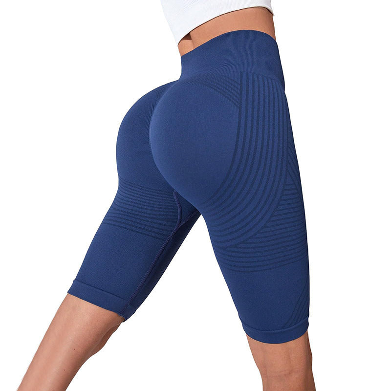 Pantalones de fitness sin costuras con efecto levantamiento de glúteos, control de abdomen y shorts de yoga de talle alto color melocotón.