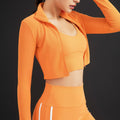 Conjunto de yoga sexy sin costuras con cremallera y tejido acanalado para mujer, 2 piezas, top corto de manga larga, chaleco y leggings de cintura alta para gimnasio y entrenamiento.